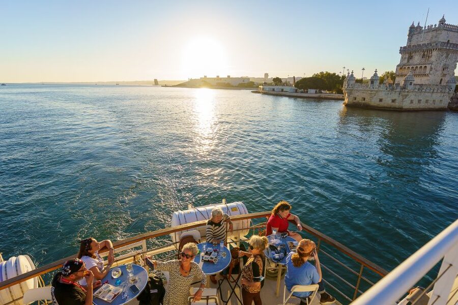 Lisbon: Tagus River Sunset Tour with Snacks and Drink - The 25th of April Bridge: the long-span star of the cruise