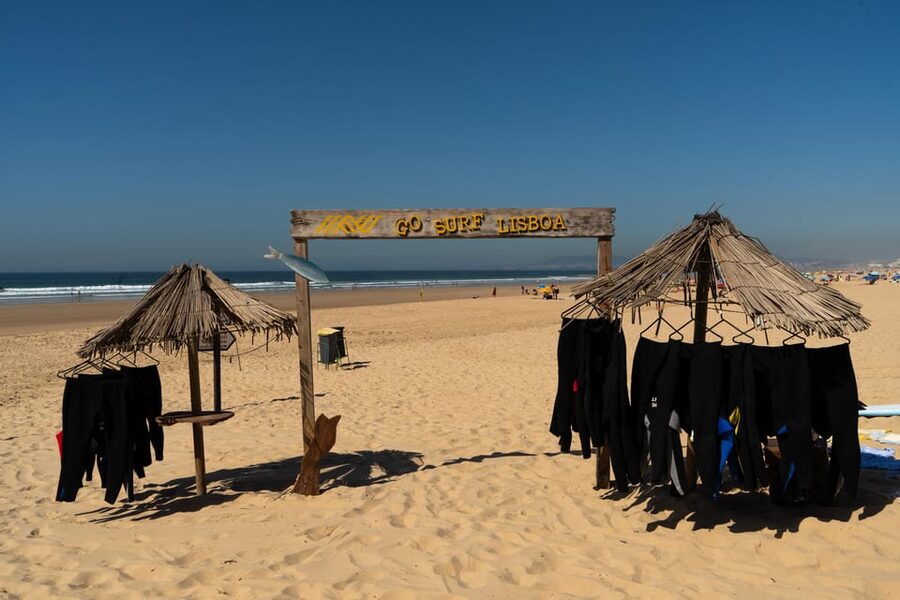 Lisbon: The Surf Instructor - surf lessons with transfer - Beach club after: where you can reset