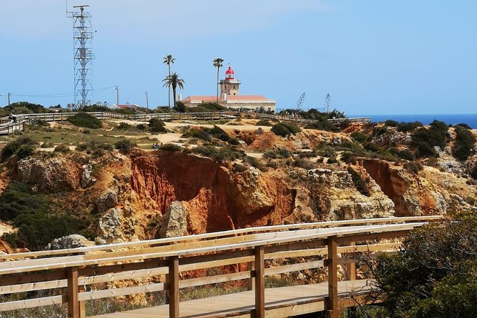 Lisbon to Algarve Private Tour: Benagil Caves Cruise & Top Sights - Praia do Carvoeiro: cliffs, turquoise water, and quick photo moments