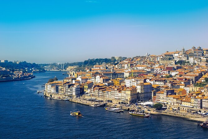Lisbon to Porto or Porto to Lisbon private transfer - Pair Nazaré with one extra town stop (and pick what fits your mood)