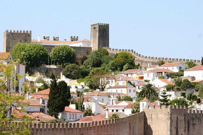 Lisbon to Porto Up To 5 Stops Óbidos Nazaré Fátima Coimbra Aveiro - Fátima: basilicas, Mass options, and planning for religious items