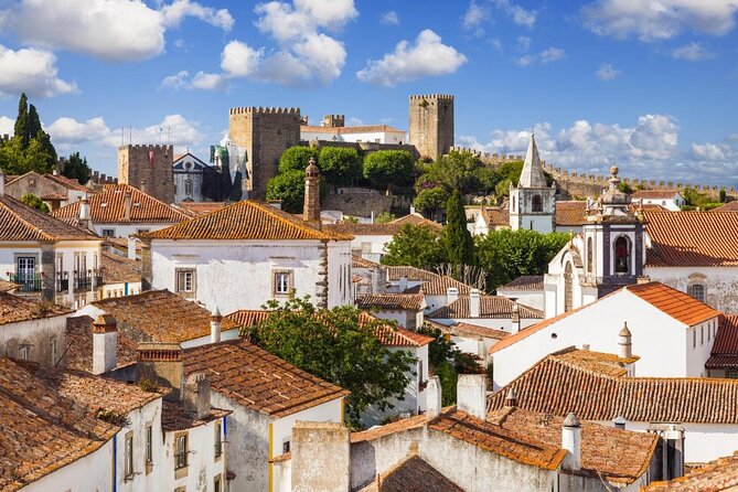 Lisbon to Porto with stop Aveiro-Fátima-Coimbra-Tomar-Nazaré-Óbidos - Key highlights you will feel right away