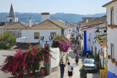 Lisbon to Porto with stops Obidos Nazare Fatima Coimbra Aveiro