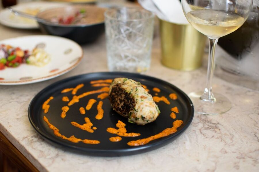 Lisbon Traditional Portuguese Food and Sightseeing Tour - Stop 3: wine tasting at the final restaurant, plus a satisfying finish