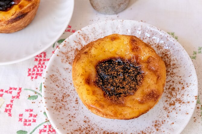 Market Tour, Cooking Class And Lunch At Mercado de Arroios - Lunch at the table: amuse bouches, fish, stews, and crème brulée