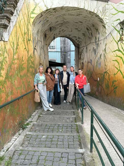 Multicultural Lisbon: Hidden Stories, Art, Food & Live Music - Wine, local snacks, and the rhythm shift toward dinner