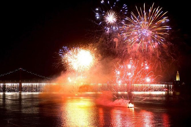 Passing the Year in a Boat with Champagne and Fireworks - Ponte 25 de Abril: Lisbon’s Bridge Views From the Water