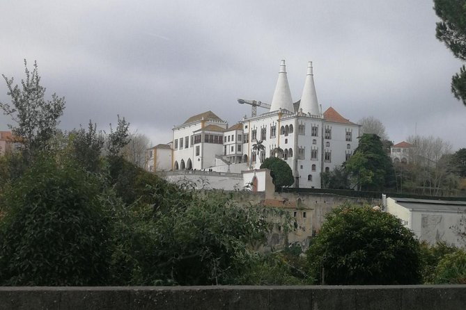 Private Day Trip to Sintra and Cascais with Pena Palace entrances - Boca do Inferno: cliff caves, ocean roar, and real safety sense