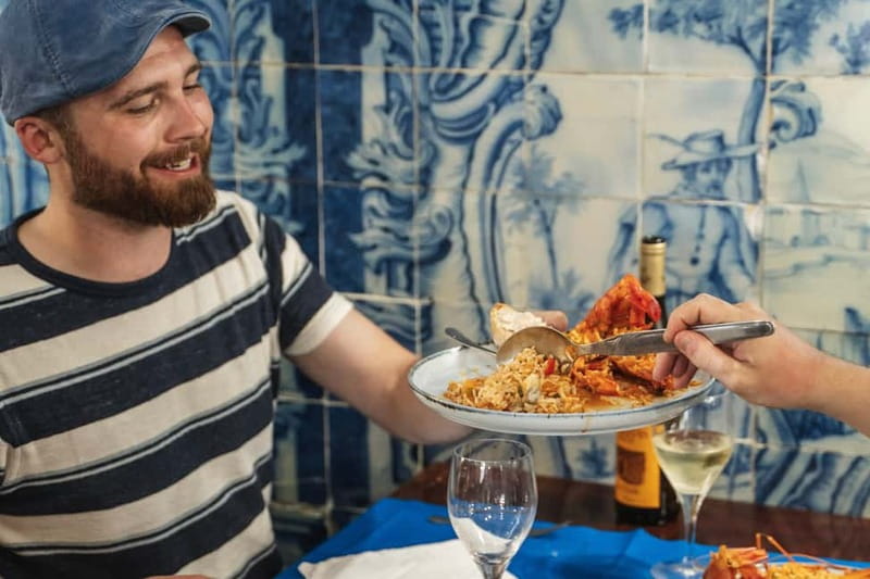 Private Lisbon Food Tour in Baixa with Wine & Local Delights - Rua dos Fanqueiros: Petiscos and Traditional Street Energy