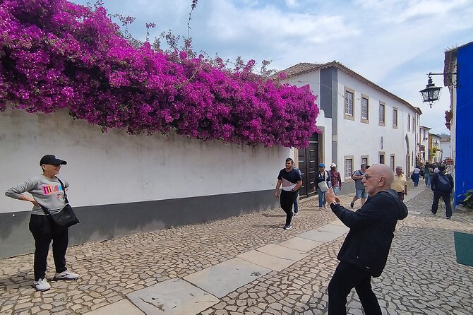 Private Lisbon to Fátima, Nazaré & Óbidos Tour – Spirit & Charm - Praia da Nazaré: the short beach stop that makes the surf stories real