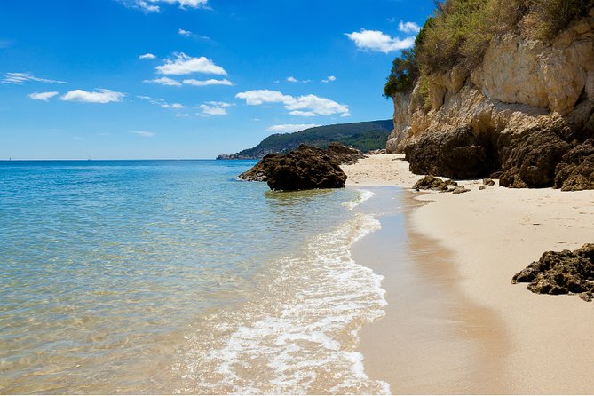 Private Tour: Arrábida Natural Park and Sesimbra Day Trip from Lisbon - From Lisbon pickup to the 25th of April Bridge, your guide sets the tone