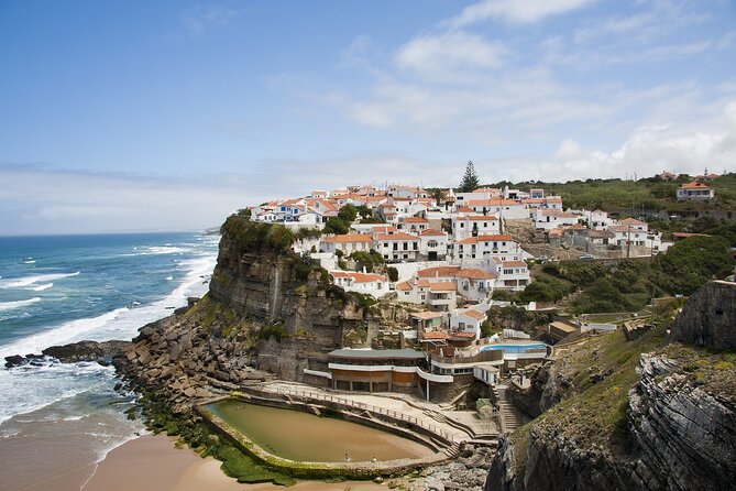 Private Tour Sintra, Pena Palace and Cascais from Lisbon - Quinta da Regaleira: Initiation Well, Caves, and Garden Magic