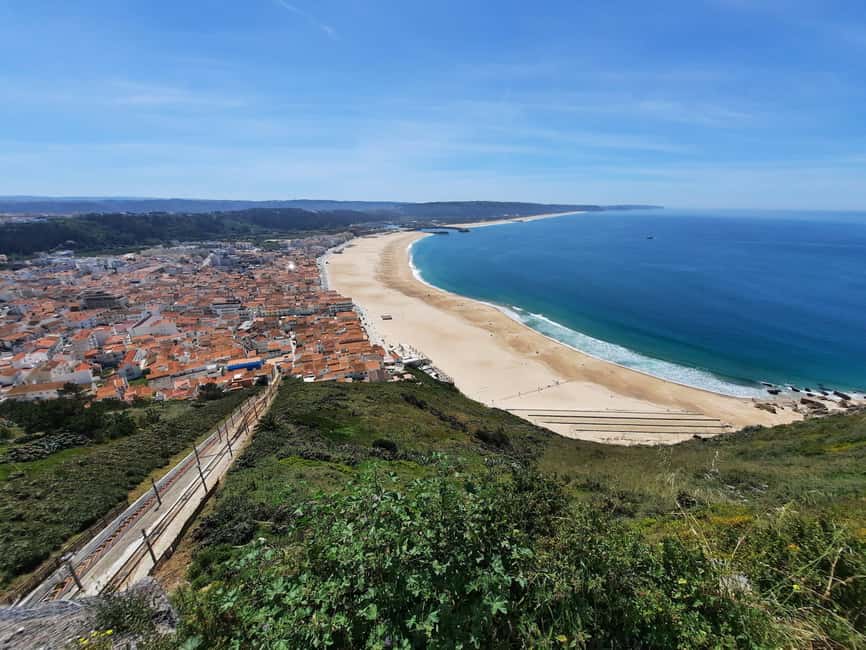Private tour to Nazaré, Alcobaça, and Obidos from Lisbon - Óbidos medieval lanes, cobbled streets, and Ginja tasting