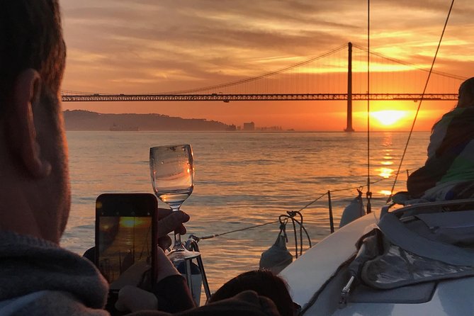 Sail & Dine Sailboat Tour With Sunset - Onboard experience: crew, wine, and how the sunset moment feels