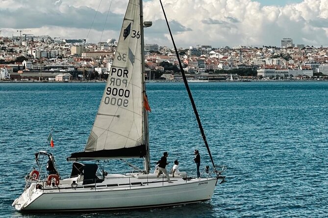 Sailboat Excursion along the Magnificent Tagus River - Sunset on the Tagus: the included drink and the relaxed pace