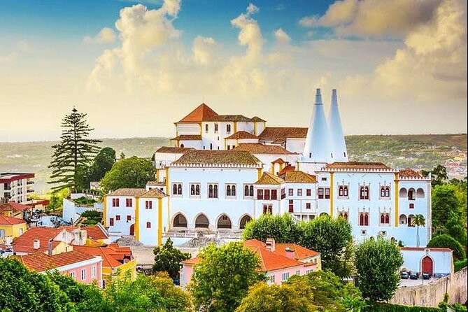 Small Group Tour to Pena Palace , Sintra , Regaleira and Cascais - Morning logistics: pickup, bottled water, and what to pack