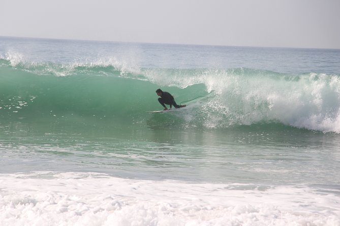 Surf Experience in Cascais - Instructor Attention in a Small Group: Gustavo, Ricardo, and Antonio
