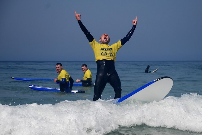 Surf Lesson in Costa da Caparica - Entering Costa da Caparica: The Red Dragon Beach Club Start