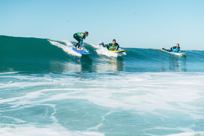 Surf Lesson in Lisbon - The surf experience - Tarquinio Beach Logistics: Lockers, Hot Stones, and Sandals