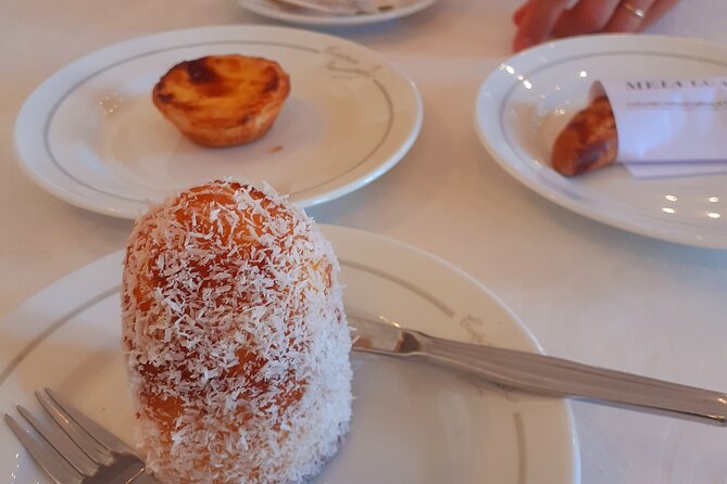 Tastes of Lisbon - Private food Tour - Stop 3 at Largo de São Domingos: Ginjinha and a Local Landmark Pause