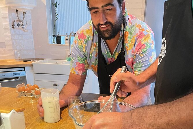 Traditional Portuguese Cooking Class in Lisbon - Drinks, snacks, and the family-style dinner moment
